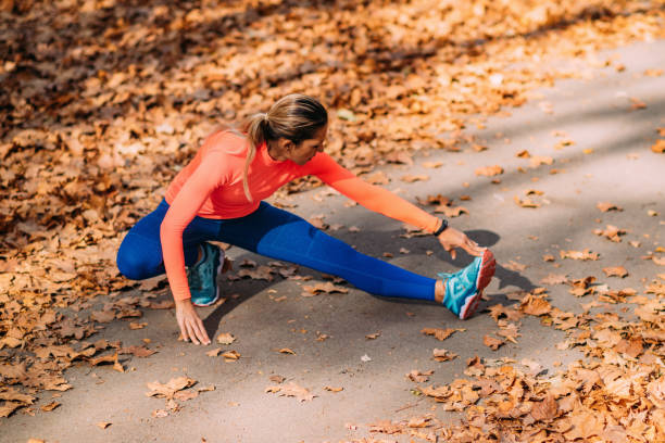 istock Woman Stretching in the Park. 1436035315