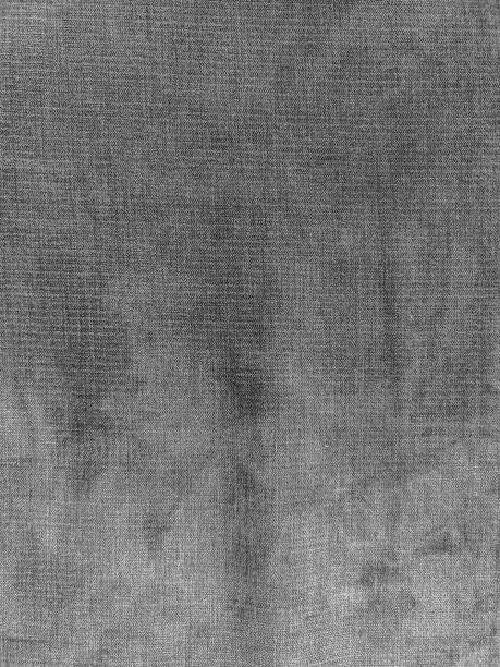 istock Vertical closeup of gray denim texture 1436035333