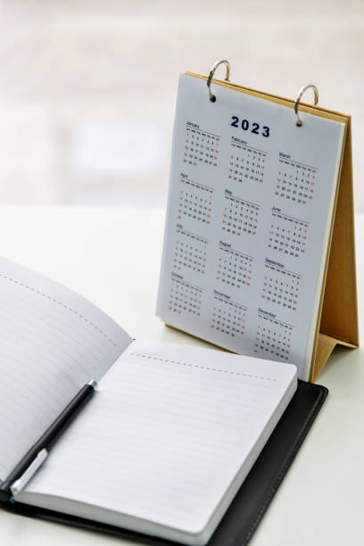 istock 2023 calendar and note pad on the desk 1436035393