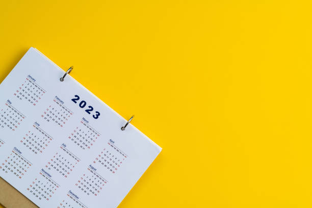 istock 2023 calendar on yellow background 1436035510