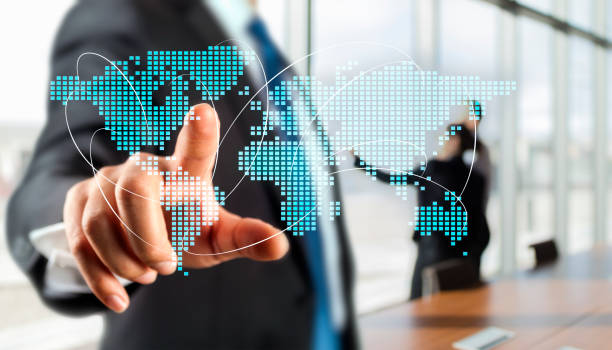 istock Businessman Pointing at Geometric Network Polygon World Map Hologram 1436036163