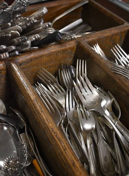 istock Closeup of collection of silver flatware in drawer 1436039178
