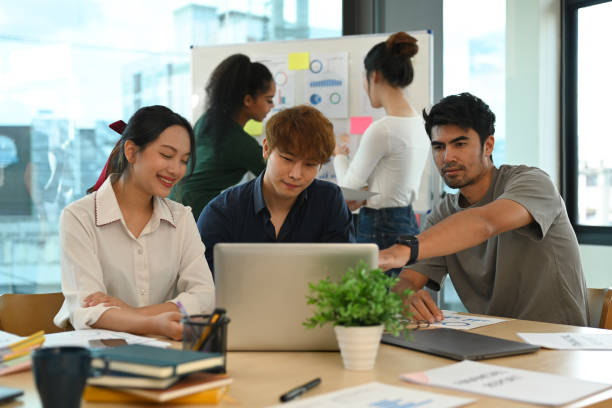 istock Startup business people in dressed casually brainstorming and working on new project at creative office. 1436042413