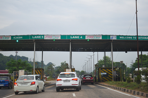 Vehicle passing through Nazirakahat (Sonapur) toll gate towards upper assam at National Highway 37.
