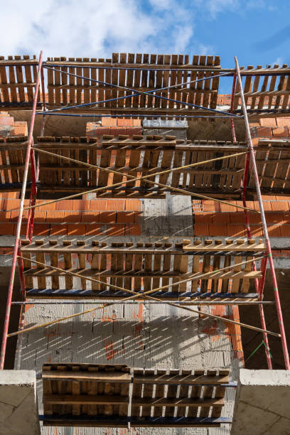 istock Construction site with building and scaffolding, closeup 1436045766
