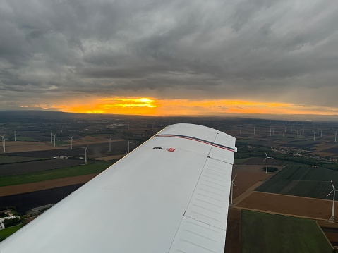 Gorgeous sunset during a flight with a light aircraft near the edge of the eastern alps.