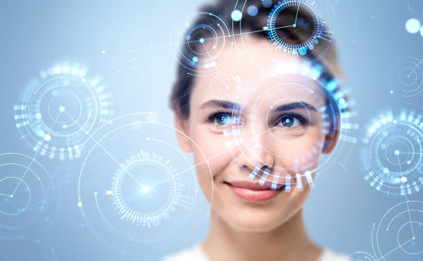 istock Smiling attractive businesswoman is watching at digital interfac 1436047987