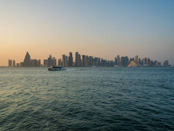 istock A boat and Doha city skyline during sunset, Doha, Qatar 1436050172