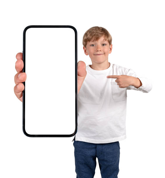 istock Kid finger pointing at phone mockup display, isolated over white 1436050946