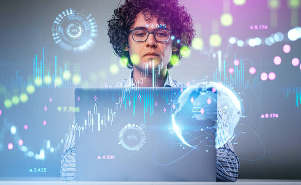 istock Businessman using laptop, forex chart with candlesticks, financial statistics 1436051144