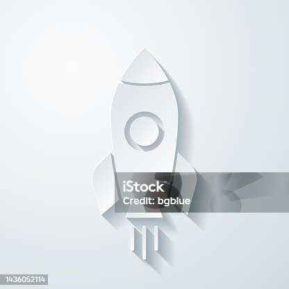 istock Rocket. Icon with paper cut effect on blank background 1436052114