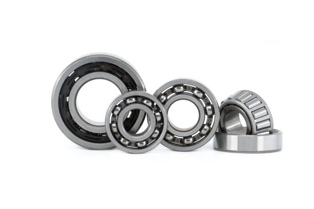istock Group of various ball and roller bearings on white 1436056461