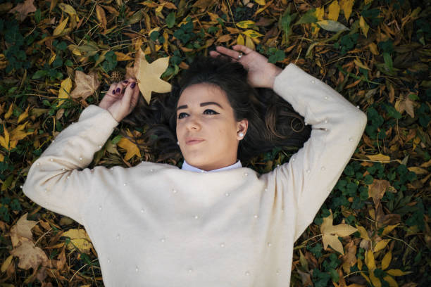 istock Beautiful young woman posing in nature. 1436057119