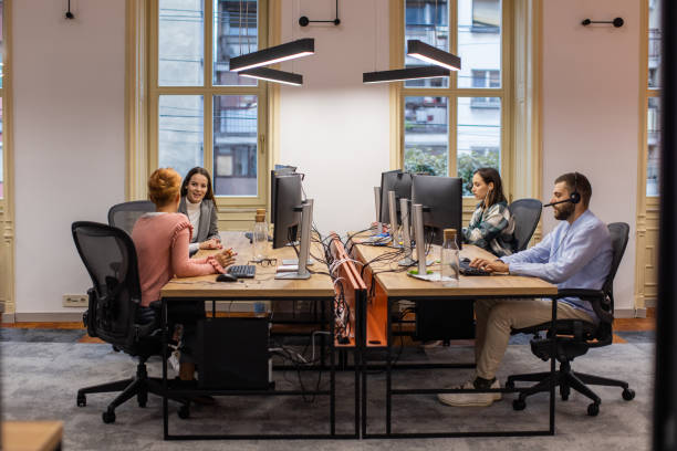 istock Group of tech support professionals working in an office 1436058303