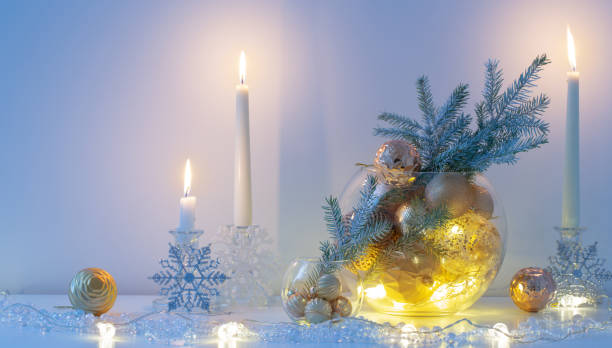 istock christmas decoration with burning candles in white interior 1436062289