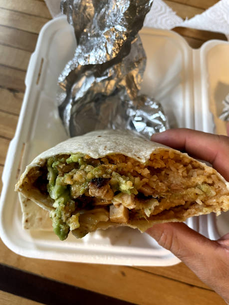 istock Chicken burrito mexican food 1436063789