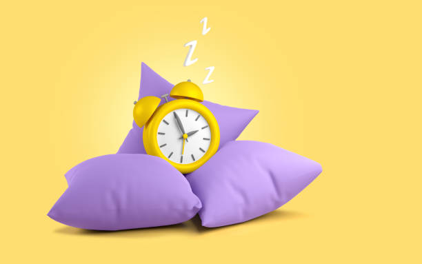 istock Yellow cartoon alarm clock resting in pillows. 3d rendering 1436066619