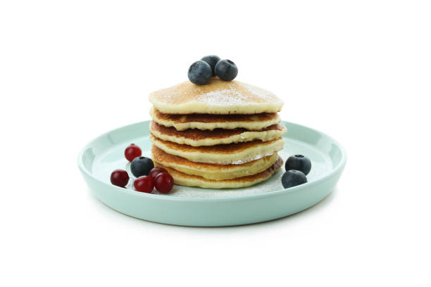 istock Plate with delicious pancakes isolated on white background 1436067780