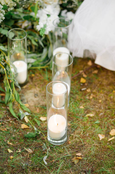 istock Candles, decor, wedding ceremony in the forest in nature 1436068075