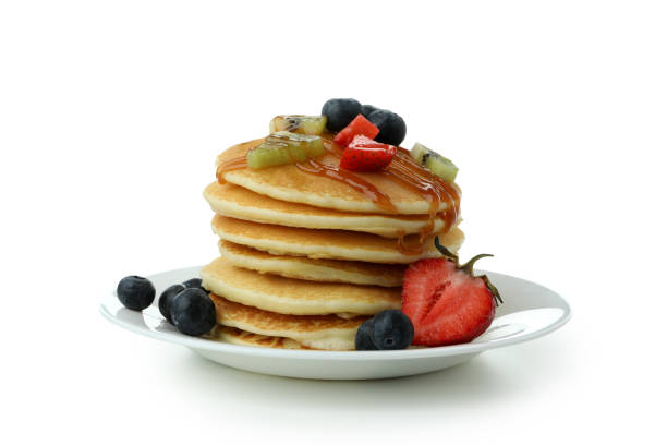 istock Plate with delicious pancakes isolated on white background 1436068195