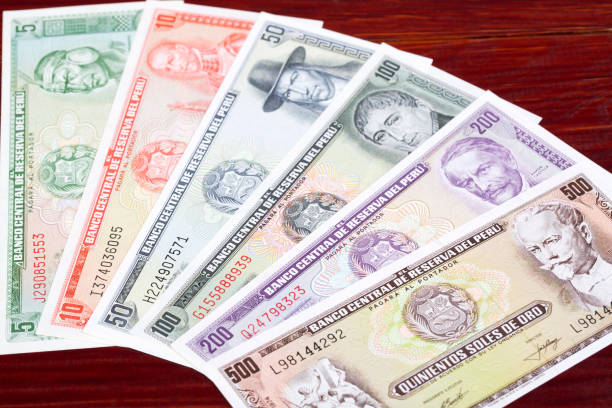 istock Old Peruvian money a business background 1436068511