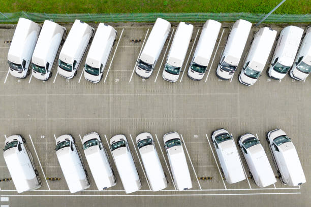 istock Delivery vans parked at a distribution warehouse 1436069465