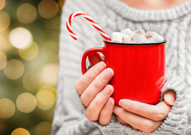 istock hands hold a red mug with a hot drink 1436070577