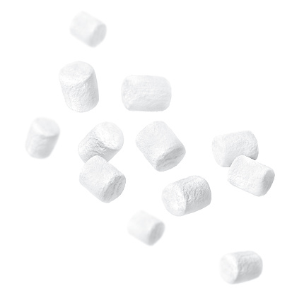 levitating marshmallows on a white isolated background