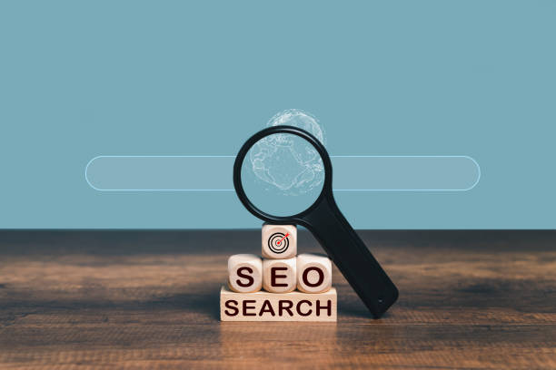 istock Magnifier glass for focus on Global business objective, isolated background and copy space. Search SEO, goal, target, strategy concept. 1436078224
