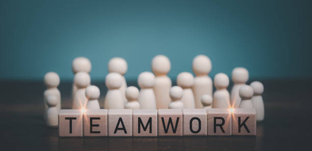 istock Teamwork concept, Wooden doll working together with Teamwork. 1436078486