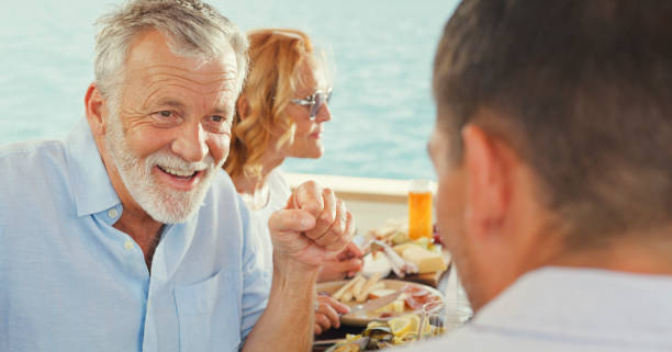 istock Man with his son talking an each other 1436081780