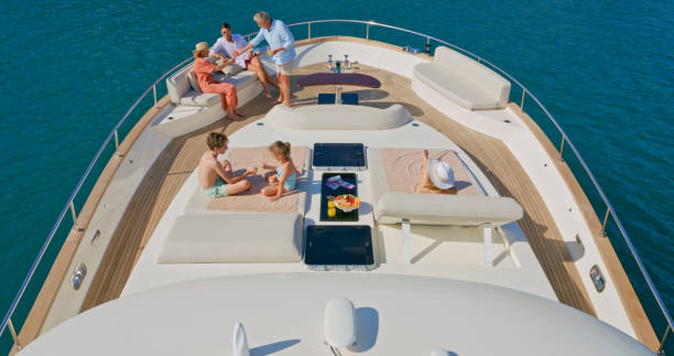 istock Family relaxing on yacht 1436081788