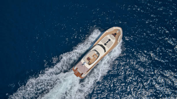 istock Modern yacht cruising in sea 1436081809
