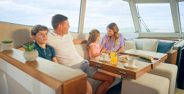 istock Family siting in yacht 1436081815