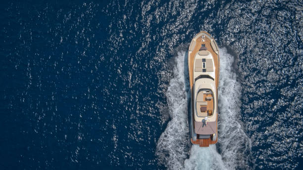 istock Modern yacht cruising in sea 1436081816