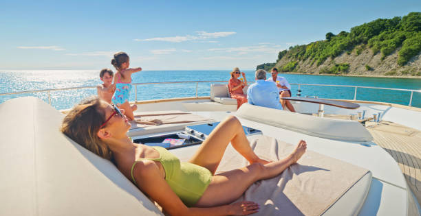 istock Family relaxing on yacht 1436081819