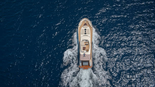 istock Modern yacht cruising in sea 1436081823