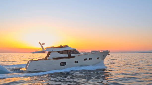 istock Modern yacht cruising in sea 1436081830