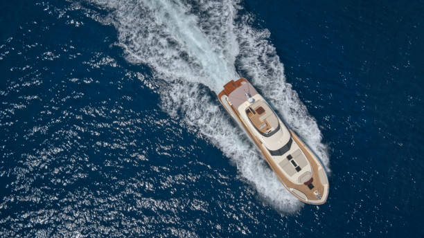istock Modern yacht cruising in sea 1436081833