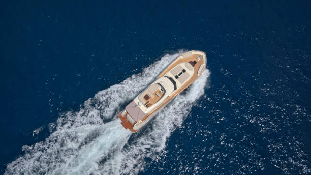 istock Modern yacht cruising in sea 1436081836