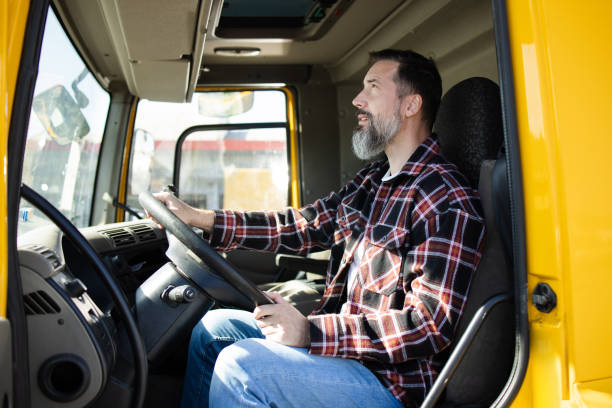 istock Mature truck driver working his shift 1436082640