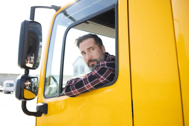 Portrait of a mature man working as a truck driver