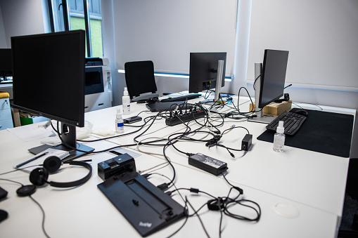 An empty office with computer equipment