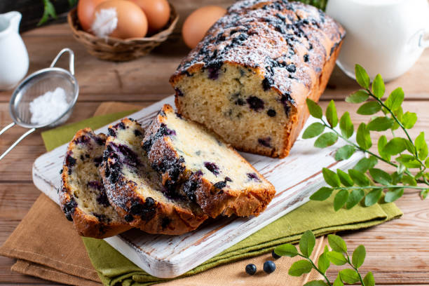 istock Blueberry cake with fresh berries on rustic wooden table 1436083634