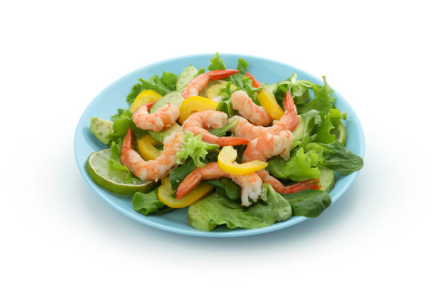 istock Tasty shrimp salad isolated on white background 1436086011