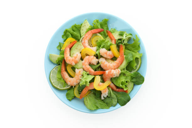 istock Tasty shrimp salad isolated on white background 1436086068