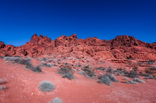 The red rock formations against the background of blue sky. Red Rock Canyon National Park, Nevada.