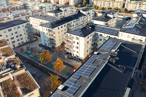 Solar panels on the roof of apartment buildings in a residential district in Stockholm.