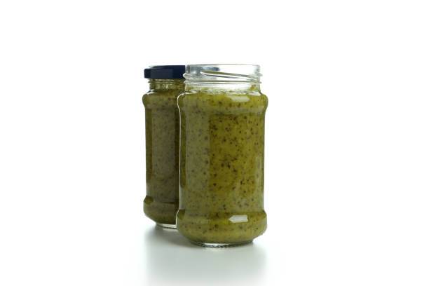 istock Jars of Pesto sauce isolated on white background 1436088268