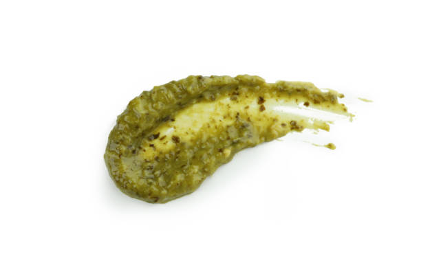 istock Tasty Pesto sauce isolated on white background 1436089460